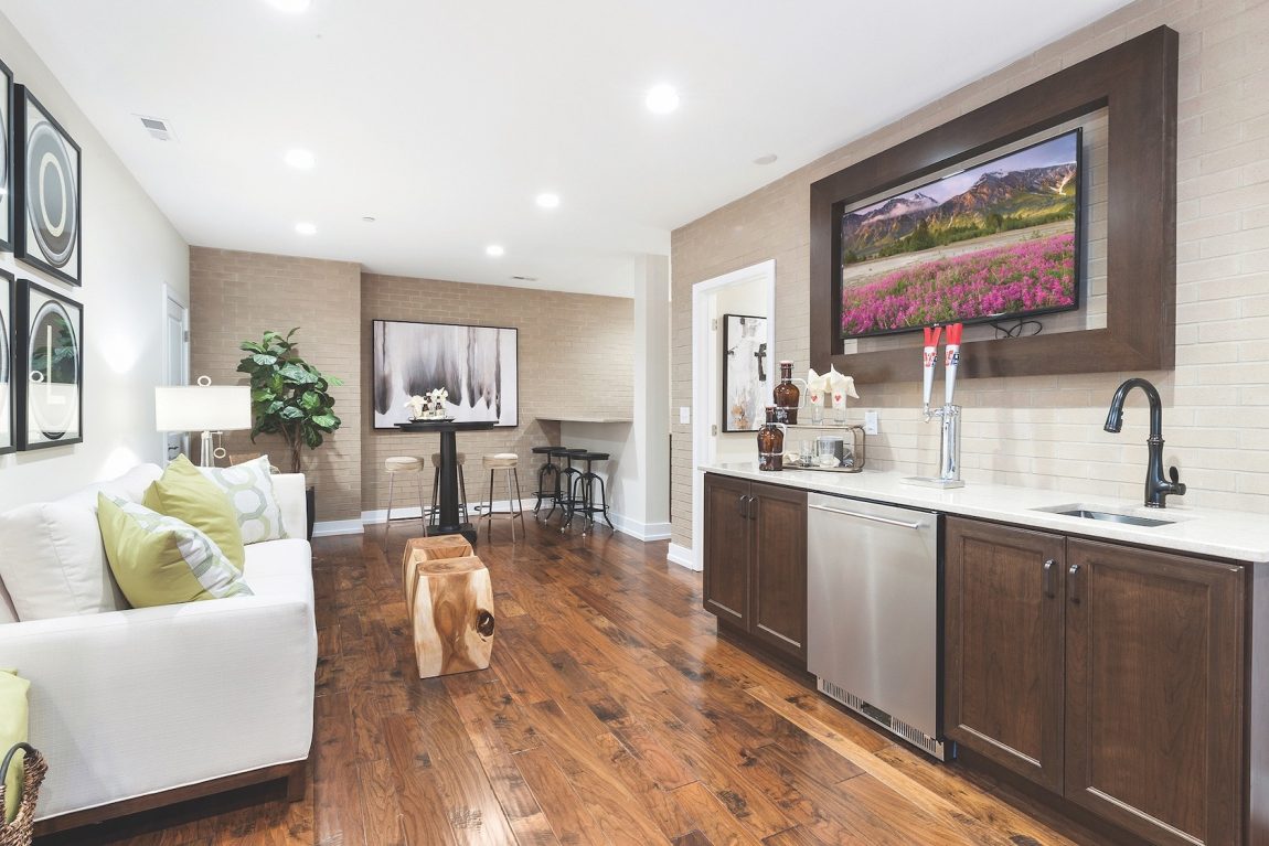 Finished basement with bar and TV