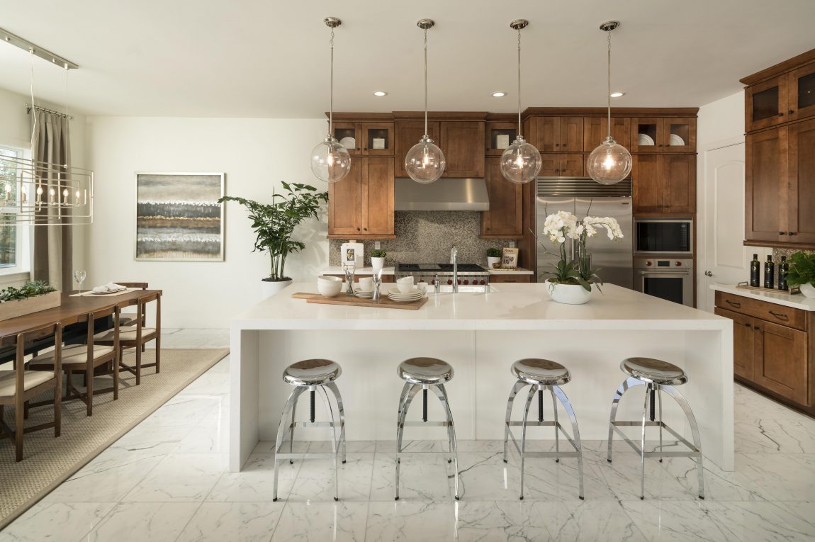Modern Kitchen with Warm white paint and wood finishes