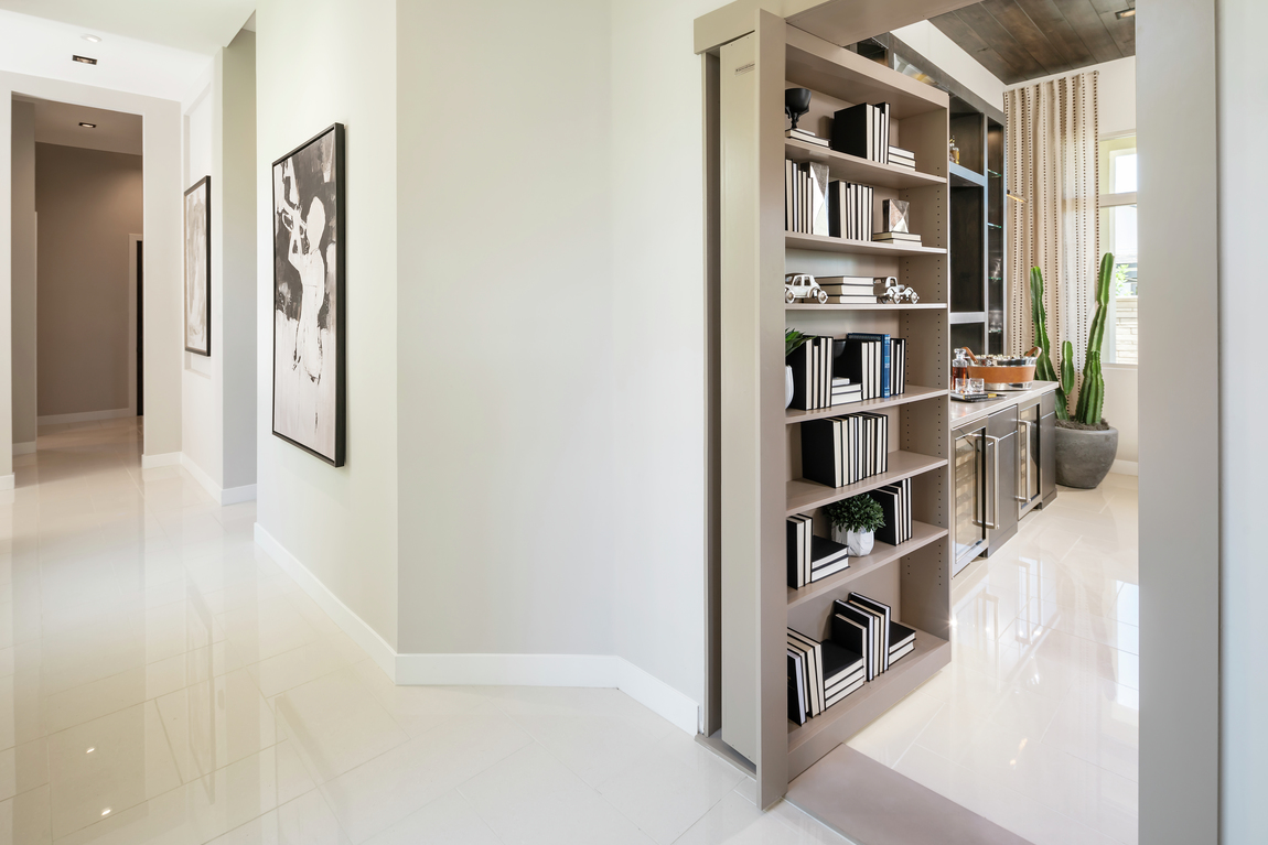 Jaw-dropping bookcase that doubles as room door