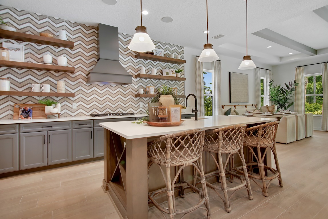 kitchen with herringbone backsplash and wooden cabinetry