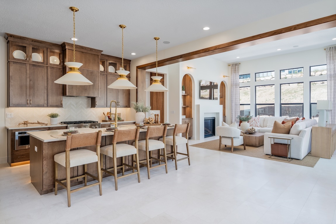 wooden cabinetry with open-concept space to the living room