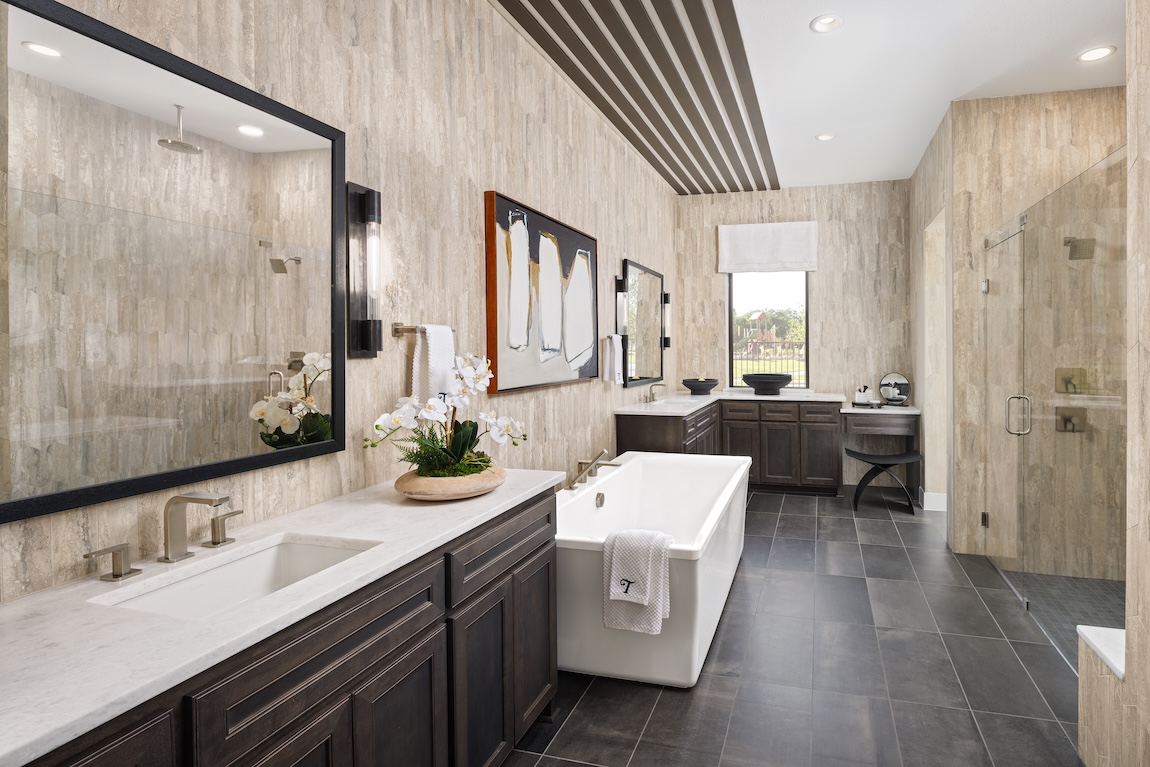 primary bathroom with tile walls