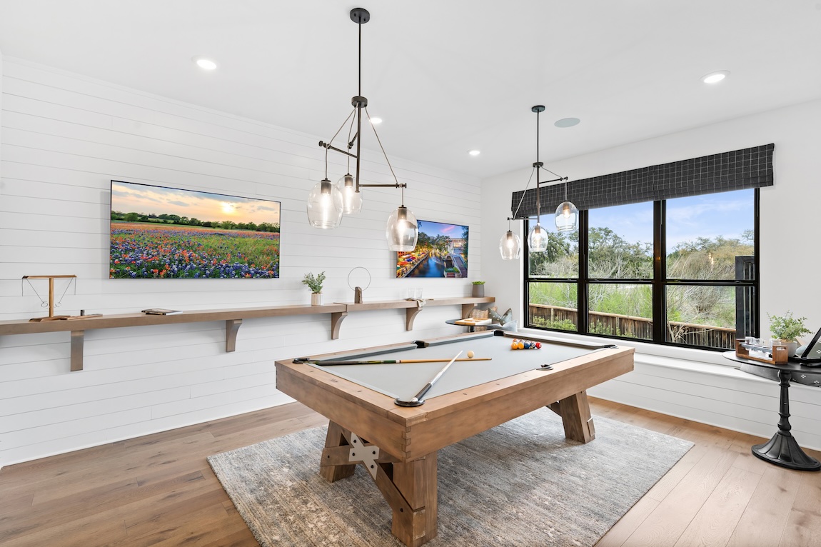 Game room featuring billiards and tvs