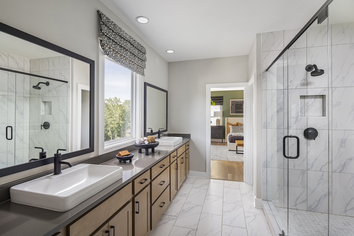 wall-to-wall vanity with wading pool sinks inside bathroom