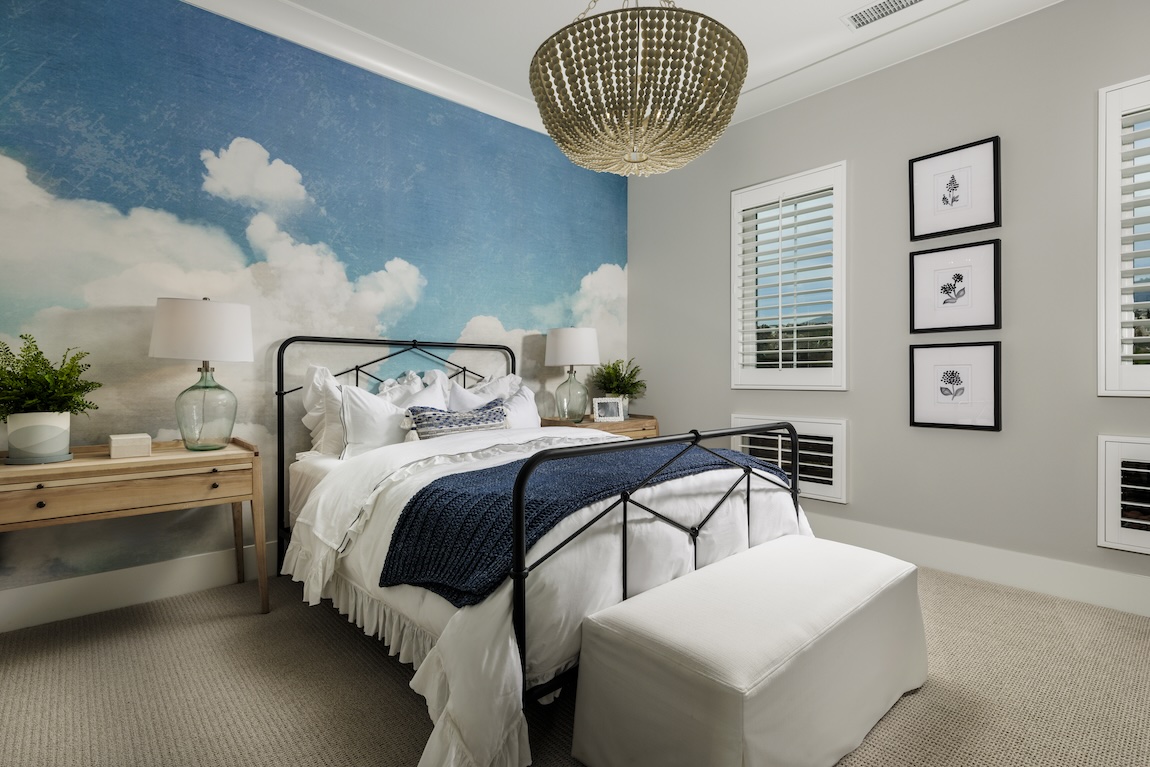 blue bedroom design enhanced by airy wallpaper theme