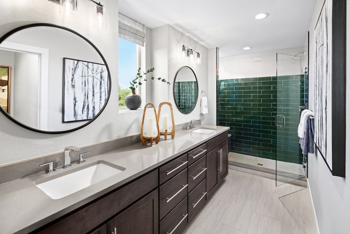 expansive bathroom design highlighted by green shower tile