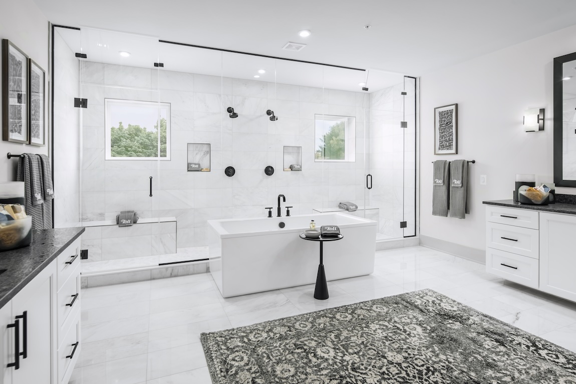 Luxe white bathroom with expansive walk-in shower