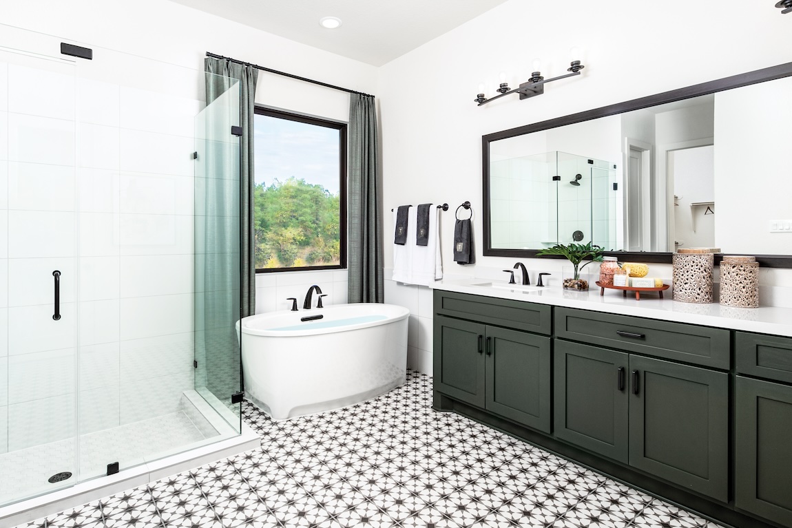 modern bathroom featuring green accent colors