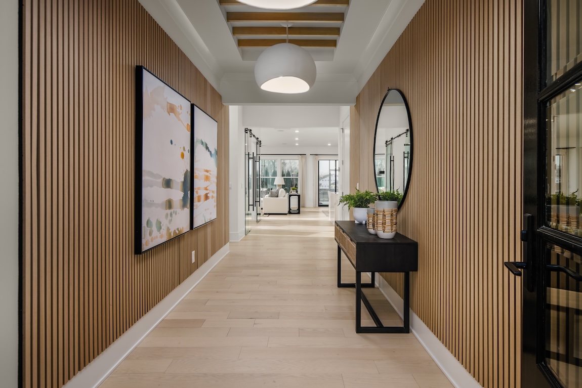 foyers highlighted by walls with fluted panel design