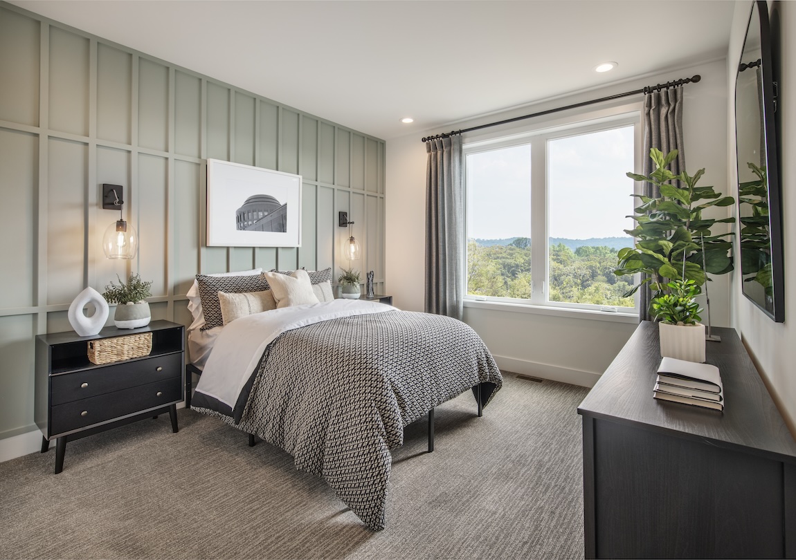 secondary bedroom with eye-catching accent wall