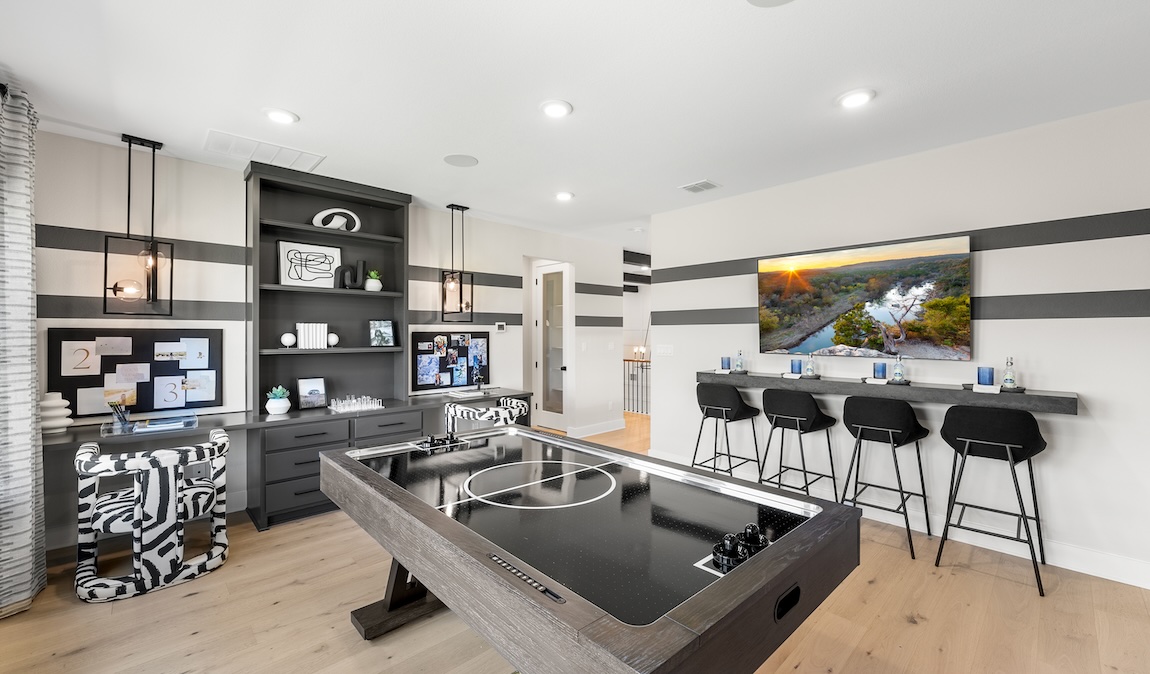 Luxe loft design highlighted by it's versatile entertainment spaces