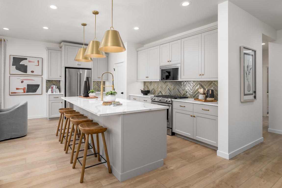 luxe kitchen featuring olive-green backsplash design