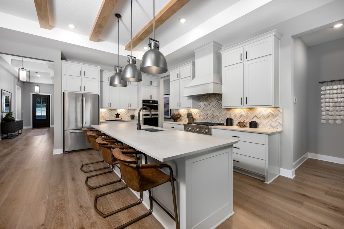 modern farmhouse kitchen featuring herringbone backsplash